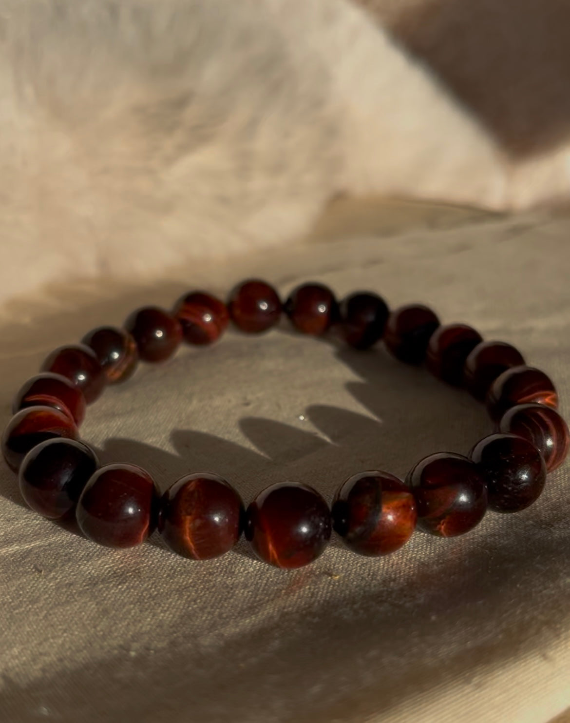 Rode tijgeroog kogelarmband 10mm